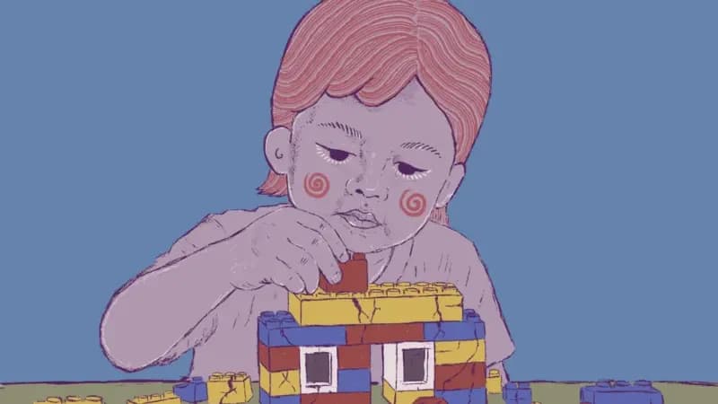 An illustration of a child with pink hair and spiral-patterned earrings, shown in soft purple tones, building with colorful toy blocks against a blue background.
